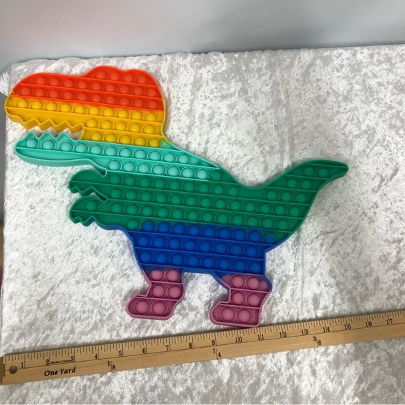 Jumbo Dinosaur Pop It T-Rex multi color rainbow toy - Picture 4 of 5